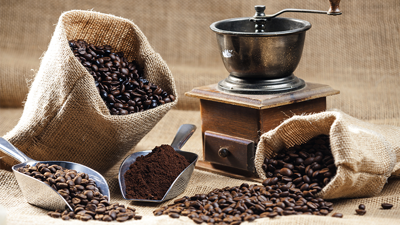 Coffee beans and grinder