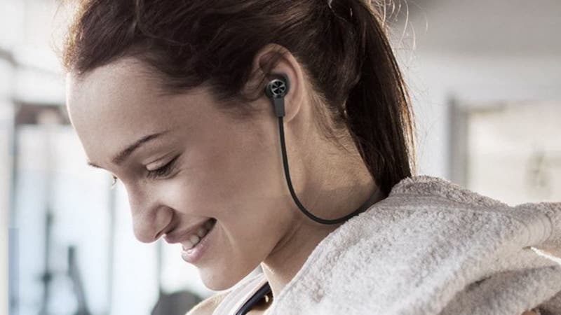 Woman wearing Bluetooth headset