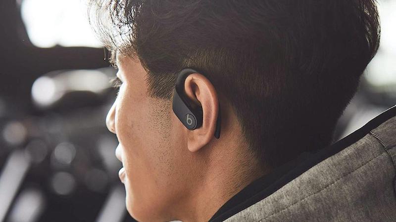 Man with in ear bluetooth headset