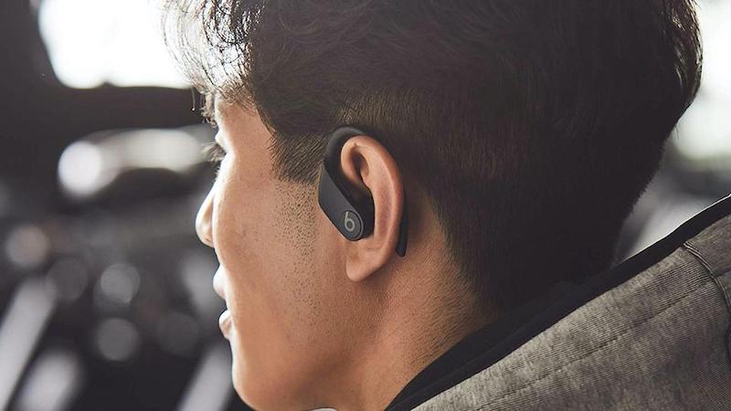 Man with in ear bluetooth headset