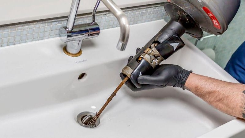 Mechanical kitchen drain unblocker