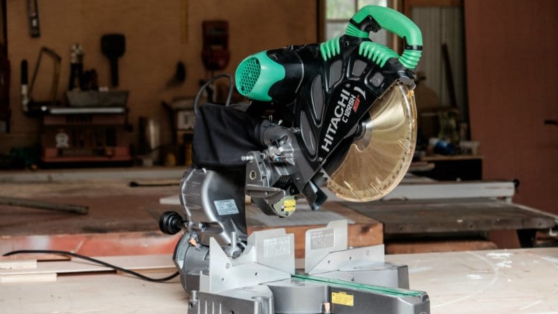 Dual compound mitre saw