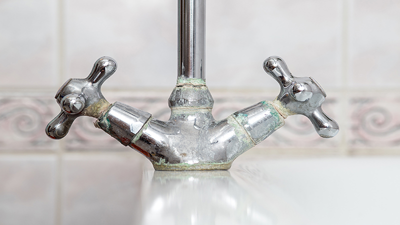 Bathroom limescale on taps