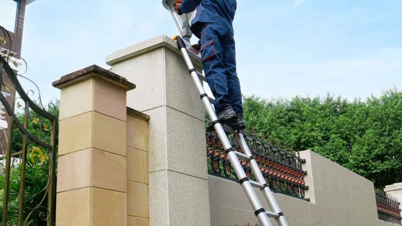 using a telescopic ladder